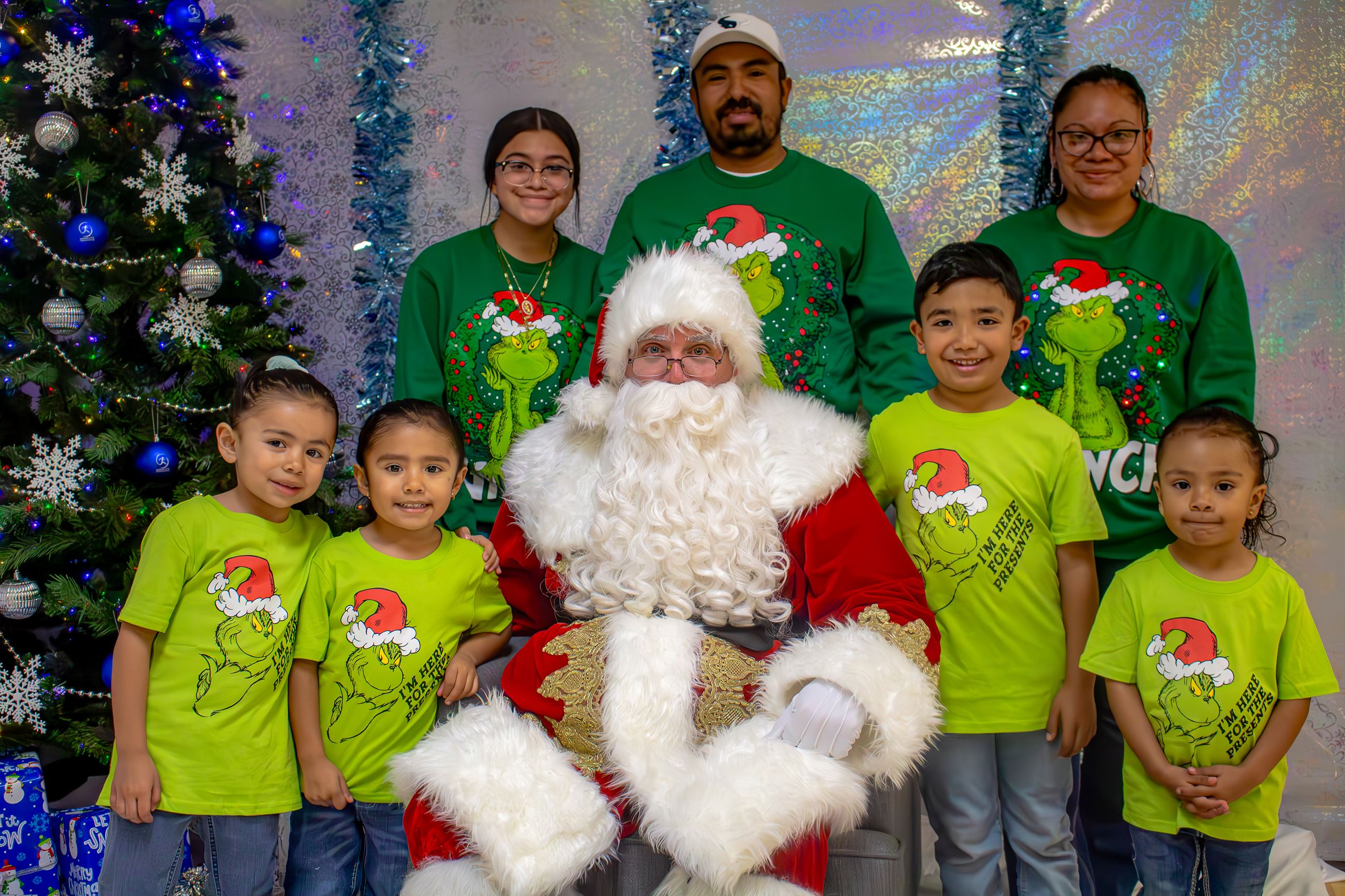 Christmas Family Photo with matching Grinch Sweaters